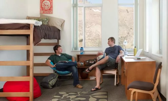 Higher Ed Building with Students lounging in CSM Maple Hall dorm