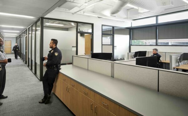 Two police officers drinking coffee